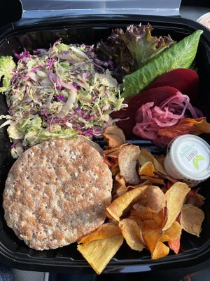 Veg burger and side salad  at FengFit Foods in Pepper Pike