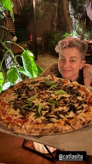 Vegan margarita pizza with mushrooms   at Pizzeria Manglar in Tulum