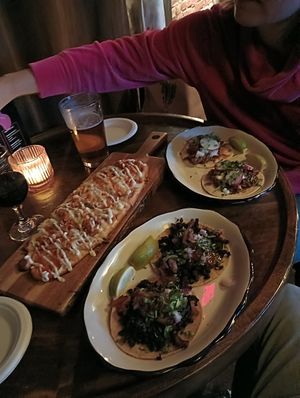 Barbacoa and al pastor tacos, buffalo flatbread at Arts & Crafts Beer Parlor in New York City