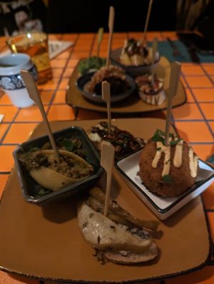From L: Broccoli, white bean conchiglioni w/leek sauce; Roast tomato, goat's cheese, caperberry crostini; Truffle zucchini arancini w/paprika aioli; Roast pear&blue cheese crostini at Follies in Fitzroy