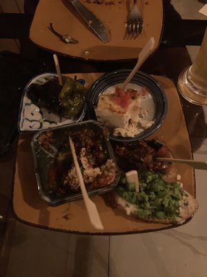 Forgot to take the photo until we were halfway through. Selection of antipasti   at Follies in Fitzroy