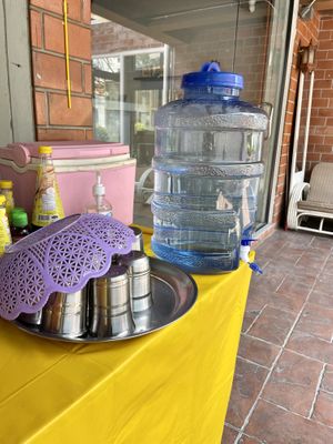 Water and cups  at Imjai Vegan in Chiang Mai