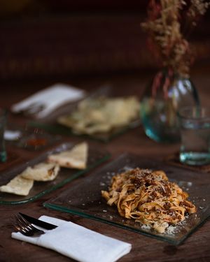 Fettucine Bolognese and our complimentary pizza bread at ARTE in Canggu