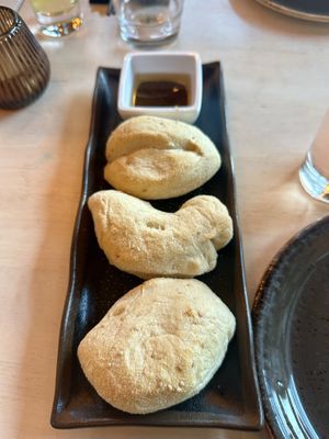 Bread with garlic oil and black bean dip  at Umami in Rotterdam