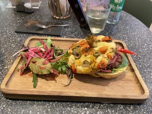 Grazie mille burger: decent, but the patty is a bit dry and thin. There are also too many sour veggies in there (onion and bell pepper). The Fritz-limo with honeydew melon is good  at Copper Branch in Almere