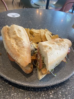 Pesto sandwich: tasty, with many chicken pieces at Copper Branch in Almere