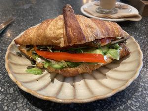 Superlicious croissant: decent, but heavy due to the extra oil on top of the pesto and cream cheese at Copper Branch in Almere