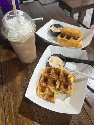 Chocolate milkshake, chicken and waffles (1/3 eaten), sausage egg and cheese waffle   at Grandma's Ice Cream & Waffles in Rockville