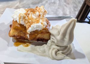 Pumpkin waffle with whipped cream, caramel sauce, and an added side of soft-serve vanilla - fully vegan! at Grandma's Ice Cream & Waffles in Rockville