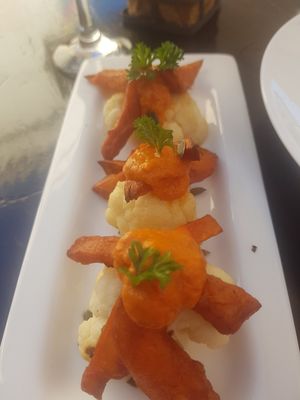 Sweet potato and cauliflower tapas. No 17 from the vegan menu. at La Plaza in Malaga