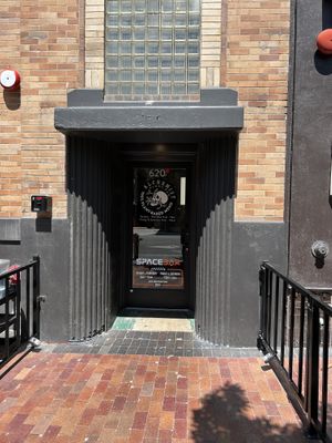 The entrance is shared with two businesses. So go through the door and then upstairs. Just to the left of the Westerner  at Alchemist Plant Pub  in Boise