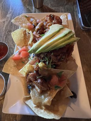Pulled Jackfruit BBQ Nachos. These are amazing !  at Alchemist Plant Pub  in Boise