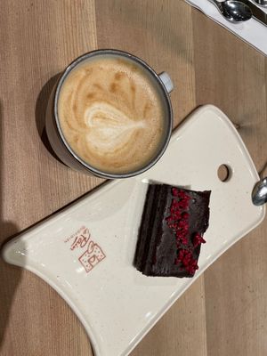 Vegan cake and oat latte  at Le Pain Quotidien - Dubai Mall in Dubai