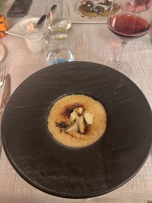Crème brûlé di ceci al profumo di aglio con funghi porcini  at La Pioda in Livigno