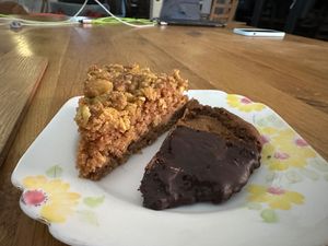 Apple and paijuri cake ( half the slice ) and half a walnut and ginger cookie at Parveen's in Glasgow