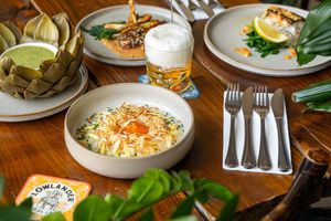 Celery root paired with sharp pecorino, creamy egg yolk, and a hint of black pepper. at Lowlander Botanical Bar & Restaurant in Amsterdam