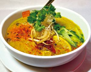 Vegan Laksa Noodle using rice noodles.  Made the soup from scratch.  topped with original spicy chili oil. at Kick Back Cafe in Tokyo