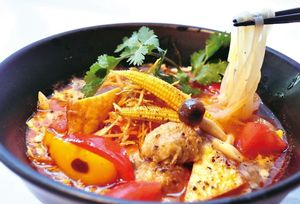 Vegan Tom Yum Noodles.  One of the three major soup in the world.  Plenty of ginger, lemon grass, and lime make the soup so tasty and flagrant.
 at Kick Back Cafe in Tokyo