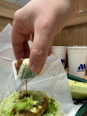 Cool sauce dispenser .  at Mos Burger - JR Hiroshima Station in Hiroshima