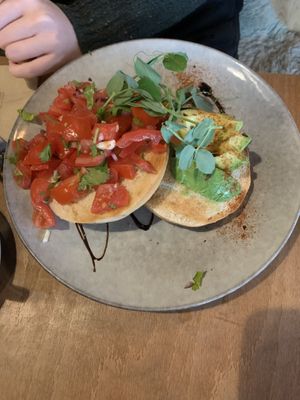 Toasted bagel with avocado and tomato salsa  at The Cosy Cafe in Hay-on-wye
