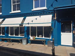 Outdoor hut/seating at The Cosy Cafe in Hay-on-wye