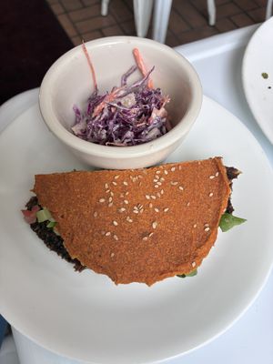 Burger cut in half. And slaw. Yum.  at Try it Raw in Birmingham