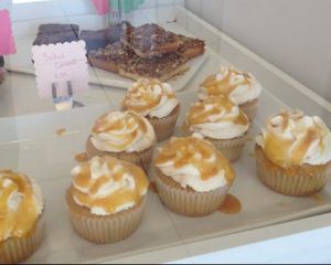 Salted Caramel cupcakes in the front; pecan bars & brownies in the back  at Treehouse Bakery in Phoenix