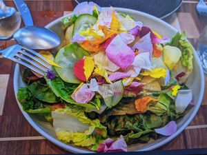 Salad of mixed greens and edible flowers at Twelvemonth in Burlingame