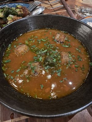 Bean Stew: Fifth Crow Farm Old Indian Woman beans, rich tomato broth, kale, rosemary croutons  at Twelvemonth in Burlingame