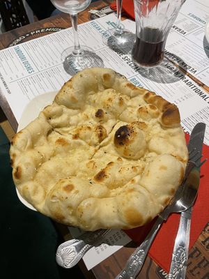 garlic naan  at Vegan India - Gloucester Rd in Bristol
