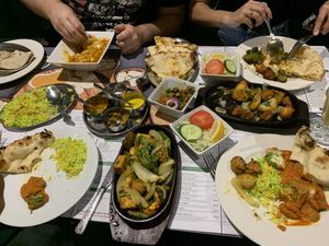 Mixed grill + lamb masala. Don’t remember what our friends had. 😄  at Vegan India - Gloucester Rd in Bristol