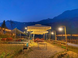 We also offer outdoor dining, where you can enjoy your meal surrounded by nature, breathing in the fresh mountain air. at Toàn Mán Restaurant  in Ta Van
