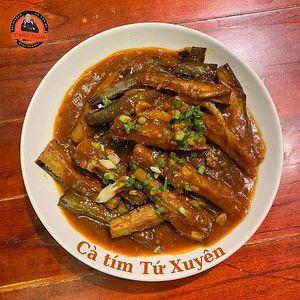 Our Sichuan-style Eggplant is a flavorful delight you can’t miss! 🍆🔥  at Toàn Mán Restaurant  in Ta Van