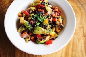 Vegan Bowl: Brussels sprouts, potatoes, carrots, bell peppers, onions, and other seasonal veggies sautéed with black rice and nutritional yeast sauce.   at Kōkeʻe Lodge in Waimea