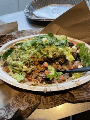 Burito Bowl with sofritas (vegan meat), tomato salsa, white rice, corn, guacamole, lettuce,  black beans, and pinto beans  at Chipotle - CF Rideau Centre in Ottawa