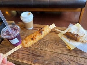 Walnut Miso Kiritanpo (Egoma Miso Kiritanpo in background) at Kojiya Motomiya Misochaya - SHIMONO528 in Hachimantai