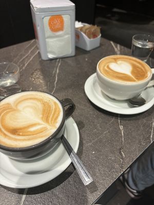 Cappuccino with soy milk (black cup)  at Dolce Vita in Venice