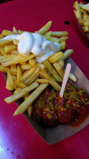 Vegan currywurst with fries and mayo at Cult Curry in Berlin