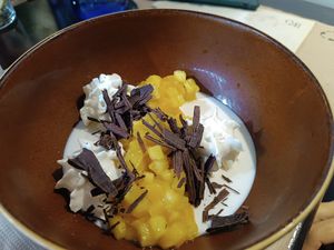 Coconut and vanilla panna cotta with mango, pineapple, lime, chocolate and passion fruit mousse...wow!!! at Baobab Soul Kitchen & Bar in Alicante
