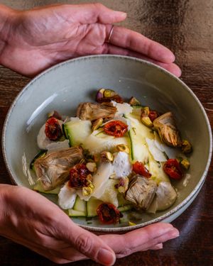 Carpaccio de calabacin con alcachofas, tomates cherry, parmesano y pistachos

 at Baobab Soul Kitchen & Bar in Alicante