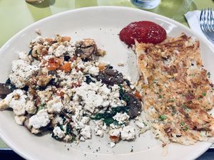 Tofu scramble was bland and dry. Hash browns not crispy   at Snooze in Frisco