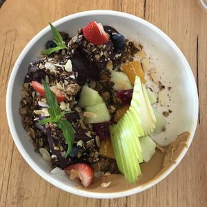 Açaí bowl with seasonal fruit, PB and granola   at Cafe McKenzie in Randwick
