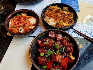 Black bean Tofu, kimchi, japchae noodles at KOKUMY in Frankfurt