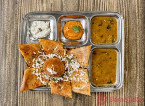 Paneer Masala Dosa - Thins crispy Indian Pancake made of rice and lentils filled with Indian cottage cheese and spicy potatoes. at Dookan Dosa Bistro in Prague