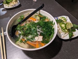 Vegan pho - rice noodle soup with mixed vegetables at Pho Noodle Station in Aurora