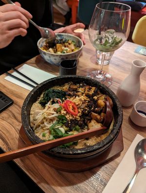 sizzling bowl of vegan dan dan noodles at Bowls in Bruges