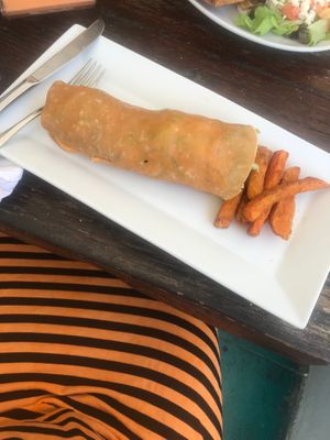 Falafel wrap & sweet potato fries at Juice Bar at ArtSplash Centre in Bridgetown