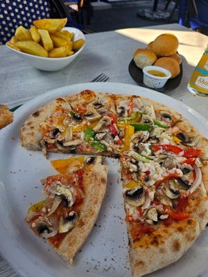 Vegan Verdure Pizza, vegan dough balls and chips. at The Lugger Inn in Penzance
