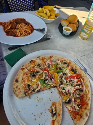 Vegan Polpette Pasta, vegan Verdure pizza, vegan dough balls, and chips. at The Lugger Inn in Penzance