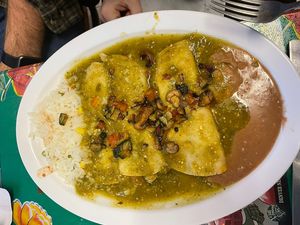 Zucchini enchiladas with a spicy tomatillo sauce. So good!  at Tarascos in Denver